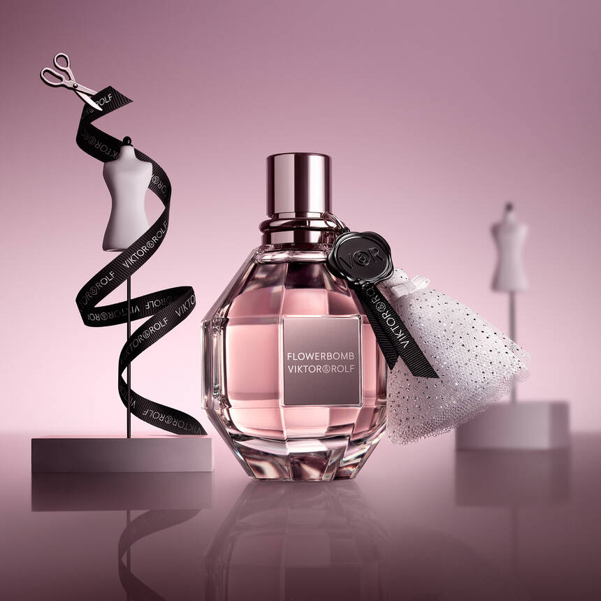 Flowerbomb Eau de Parfum bottle in pink campaign styling